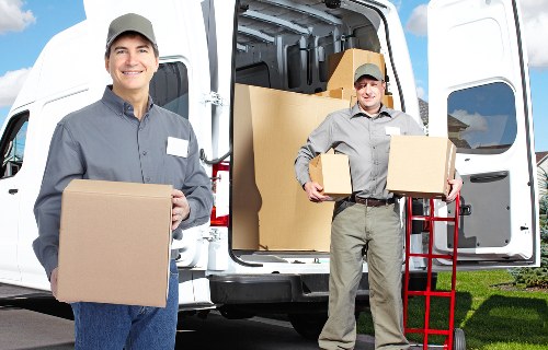 Furniture and boxes representing cubic-yard pricing for a house move
