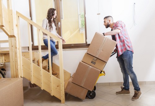 Staff securing furniture and packages for safe transport